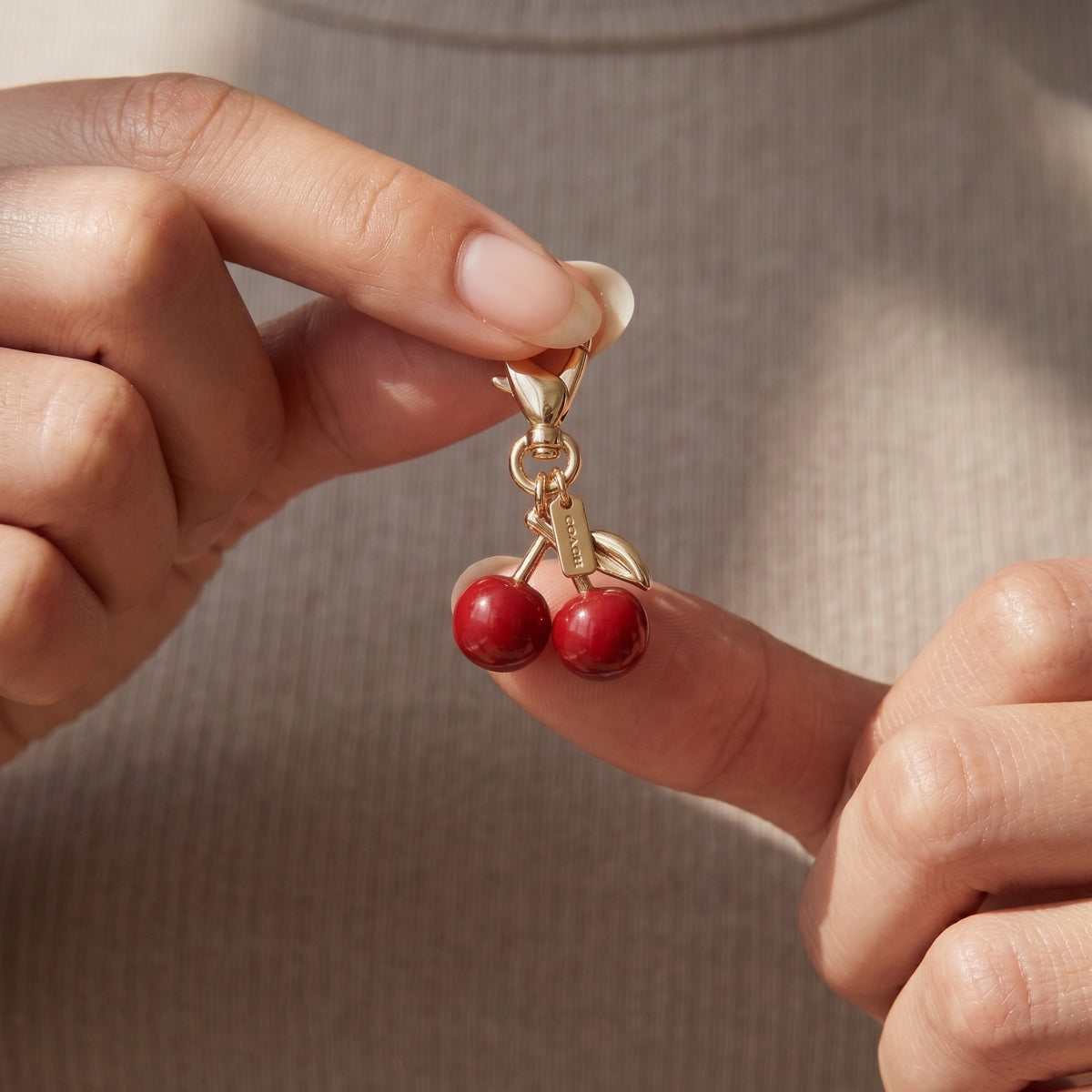 C-O-A-C-H KEY CHAIN GOLD FOR WOMEN