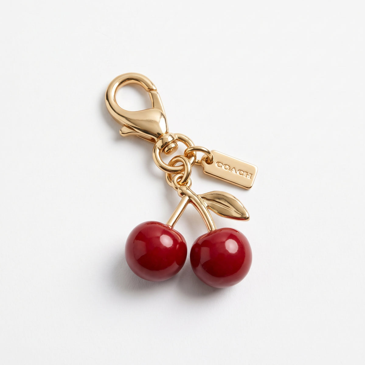 C-O-A-C-H KEY CHAIN GOLD FOR WOMEN