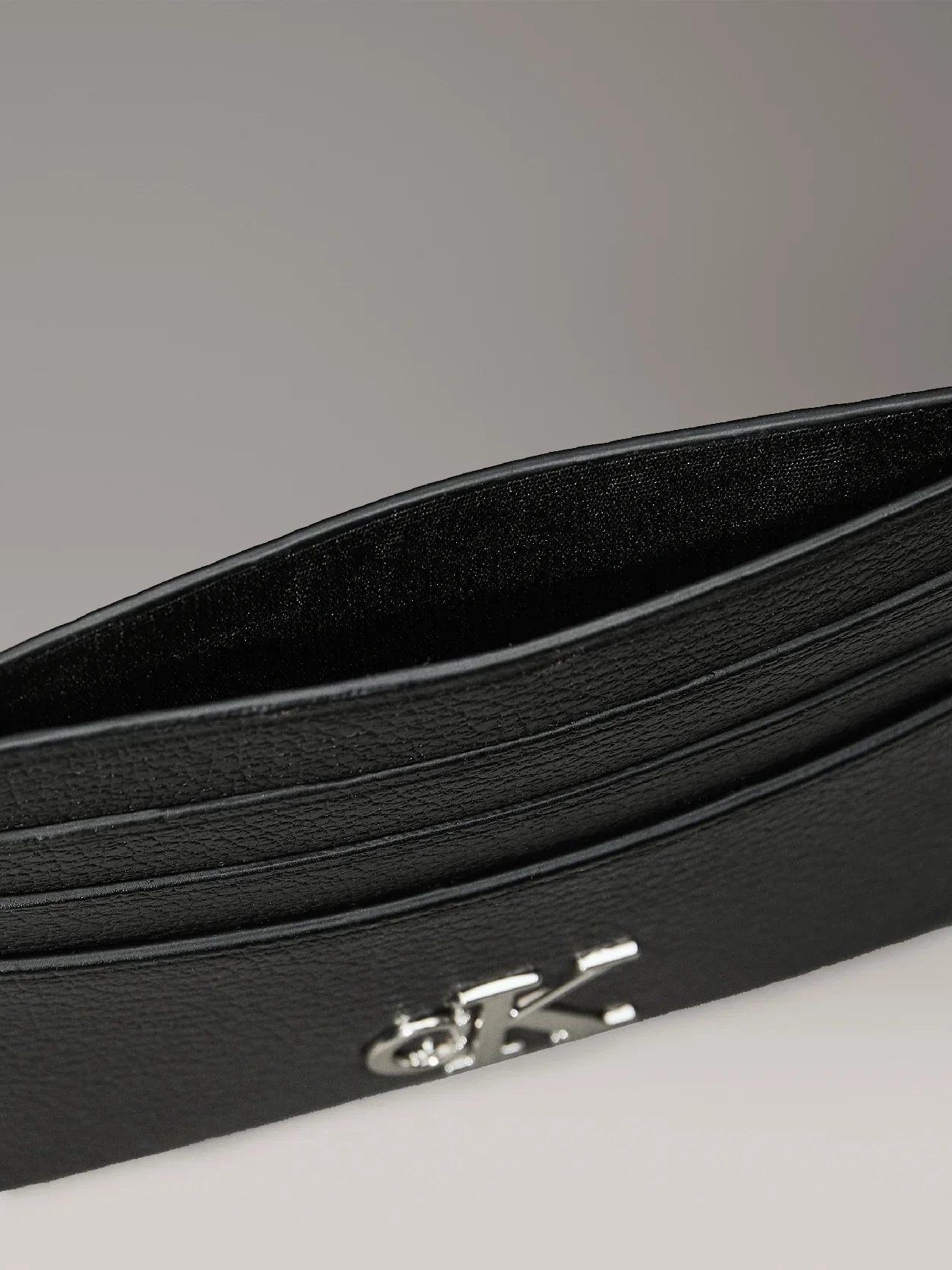 C-A-L-V-I-N K-L-E-I-N CARD HOLDER